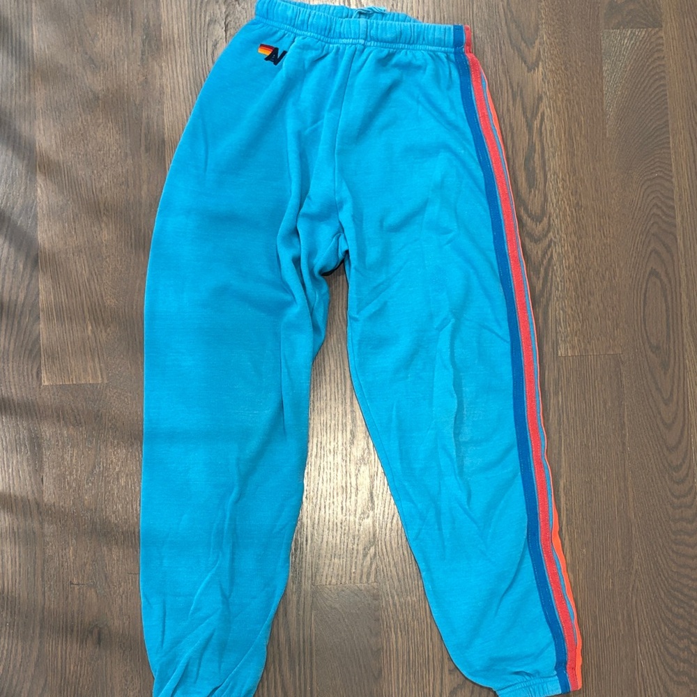 Aviator Nation Blue Track Pants with Vibrant Stripes